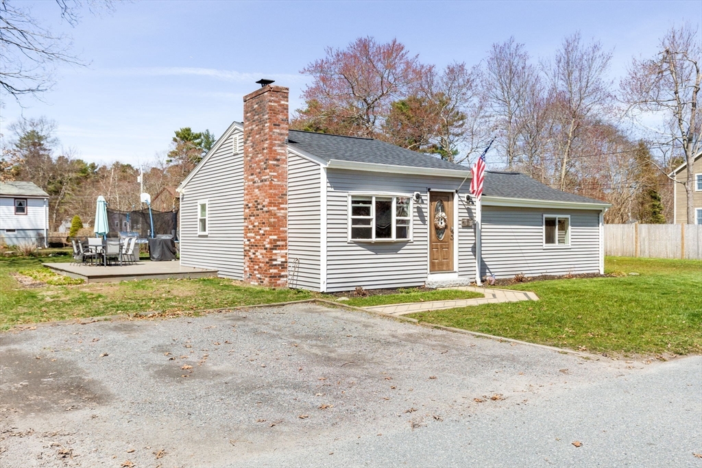11 Mayflower Road Norton, MA 02766 - Photo 3 of 22 a view of a house with a yard and garage