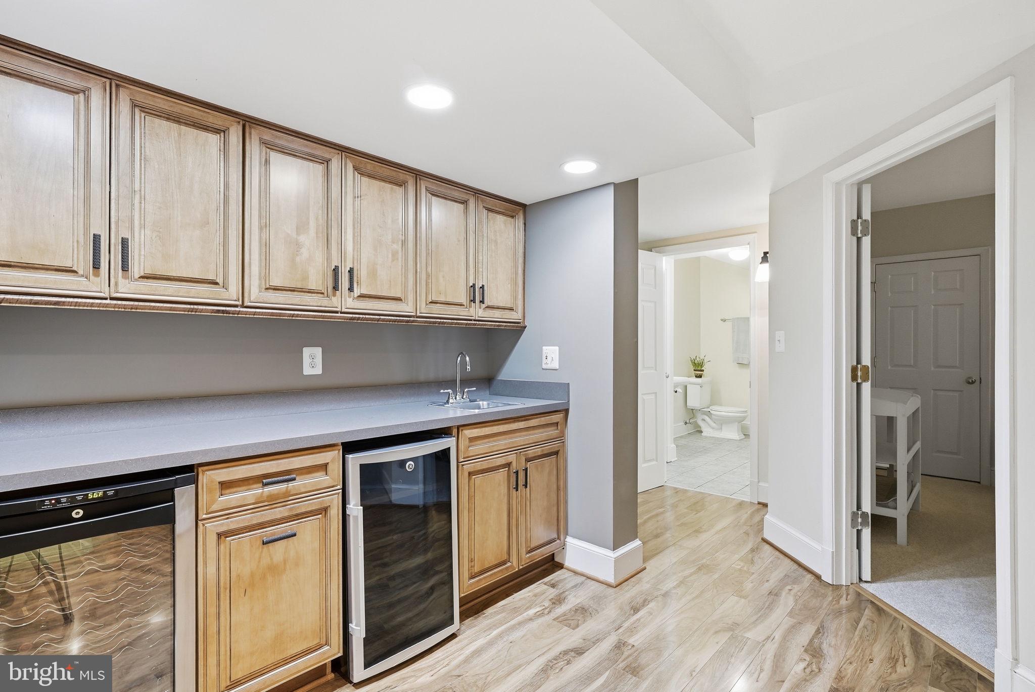 12309 Blair Ridge Road Fairfax, VA 22033 - Photo 61 of 80 WET BAR WITH WINE AND BEVERAGE CENTER