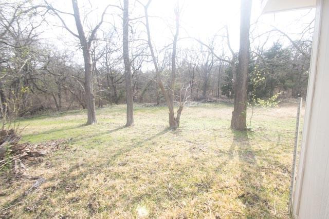 109 Simmons Loop Van Alstyne, TX 75495 - Photo 15 of 17 Yard Behind the Home