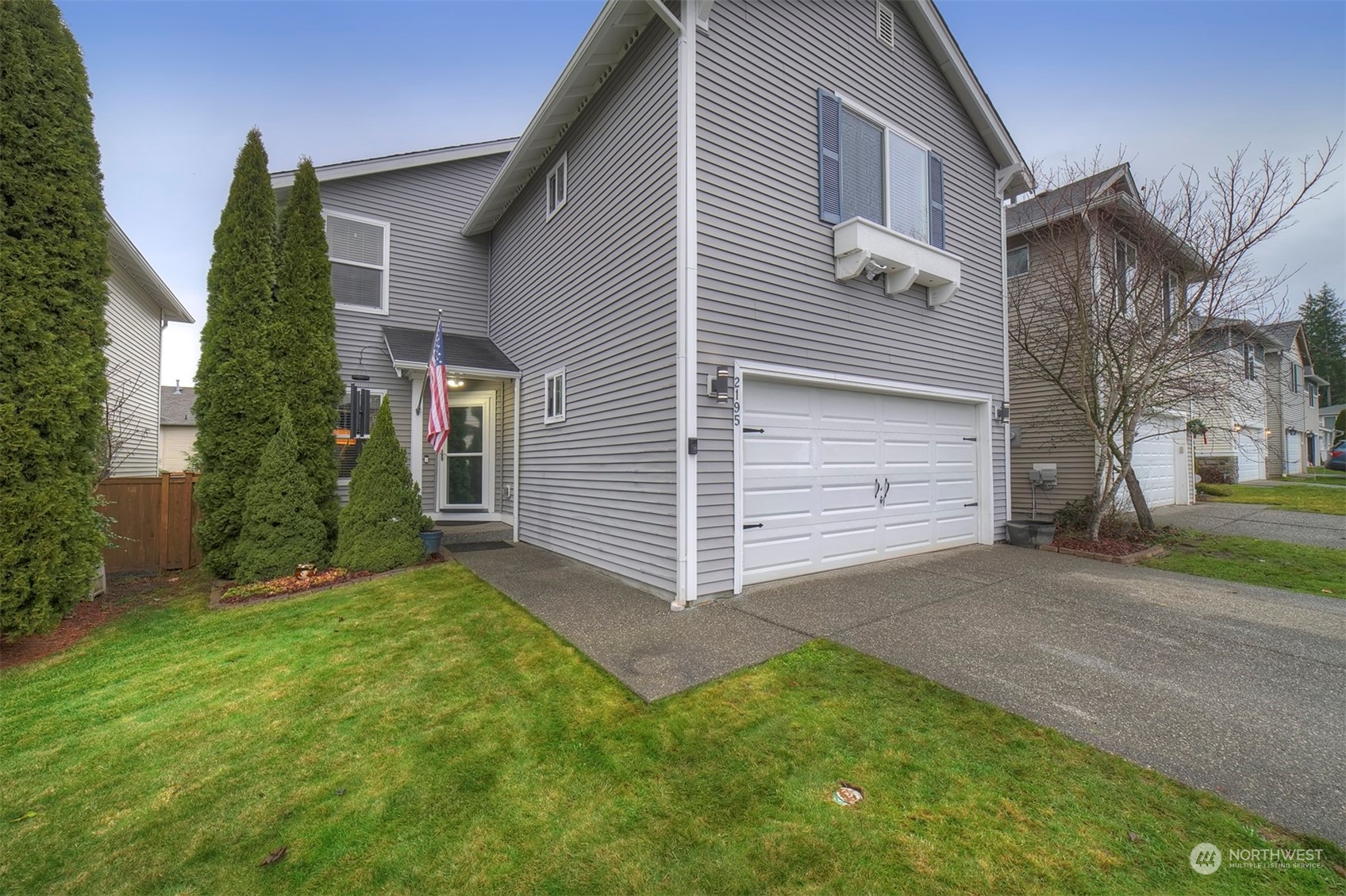 2195 Southwest Grebe Way Port Orchard, WA 98367 - Photo 3 of 40 a view of a house with a yard