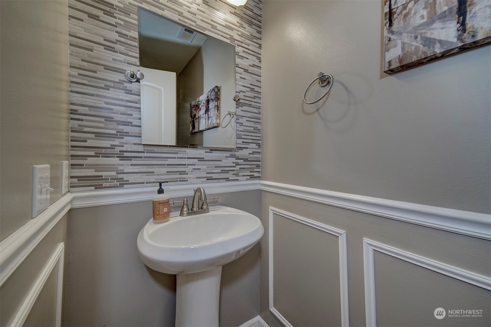 2195 Southwest Grebe Way Port Orchard, WA 98367 - Photo 5 of 40 a bathroom with a sink and a mirror