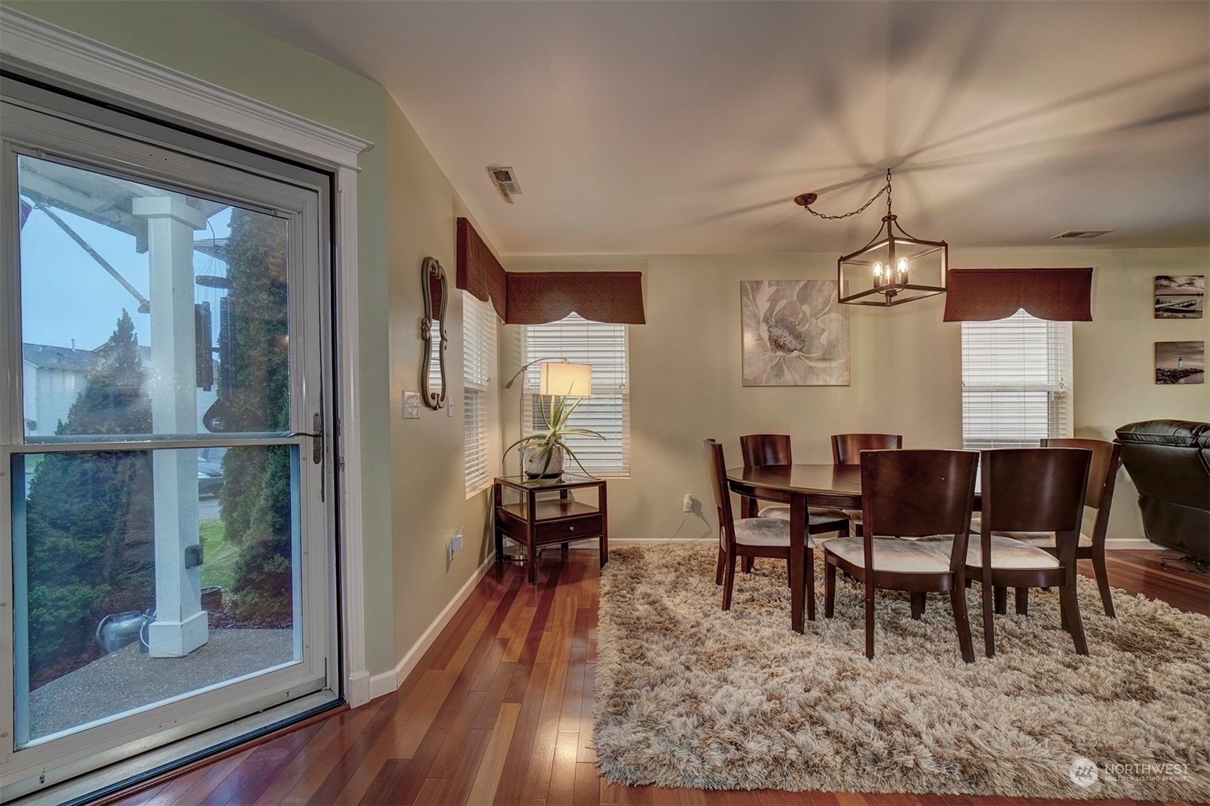 2195 Southwest Grebe Way Port Orchard, WA 98367 - Photo 7 of 40 a view of a dining room with furniture window and wooden floor