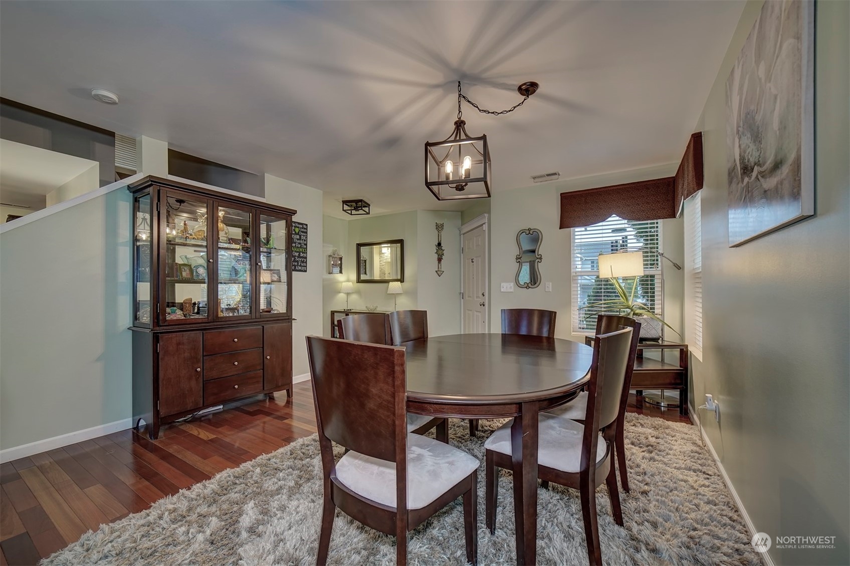 2195 Southwest Grebe Way Port Orchard, WA 98367 - Photo 8 of 40 a view of a dining room with furniture window and wooden floor