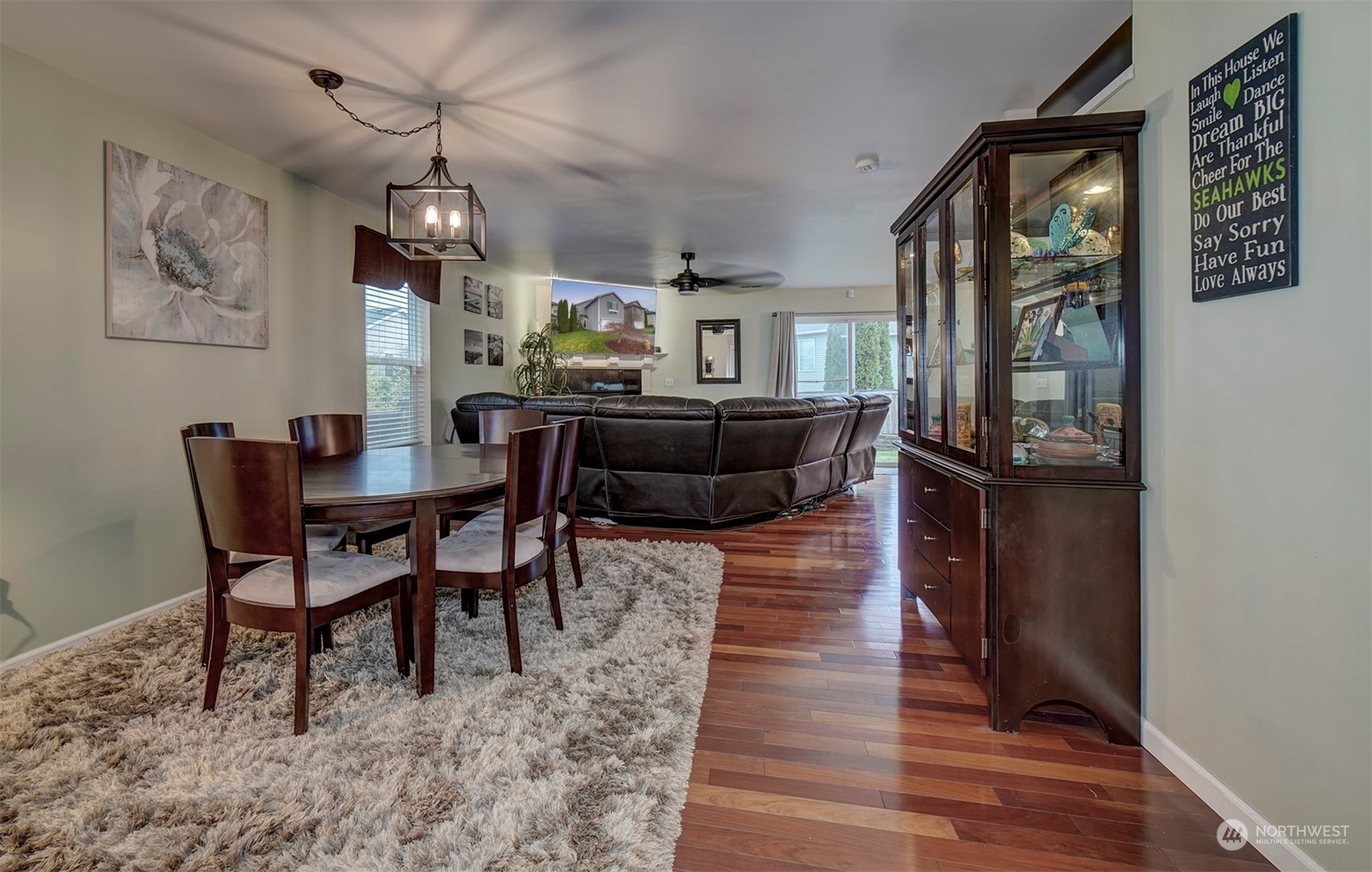 2195 Southwest Grebe Way Port Orchard, WA 98367 - Photo 9 of 40 a view of a dining room with furniture window and wooden floor