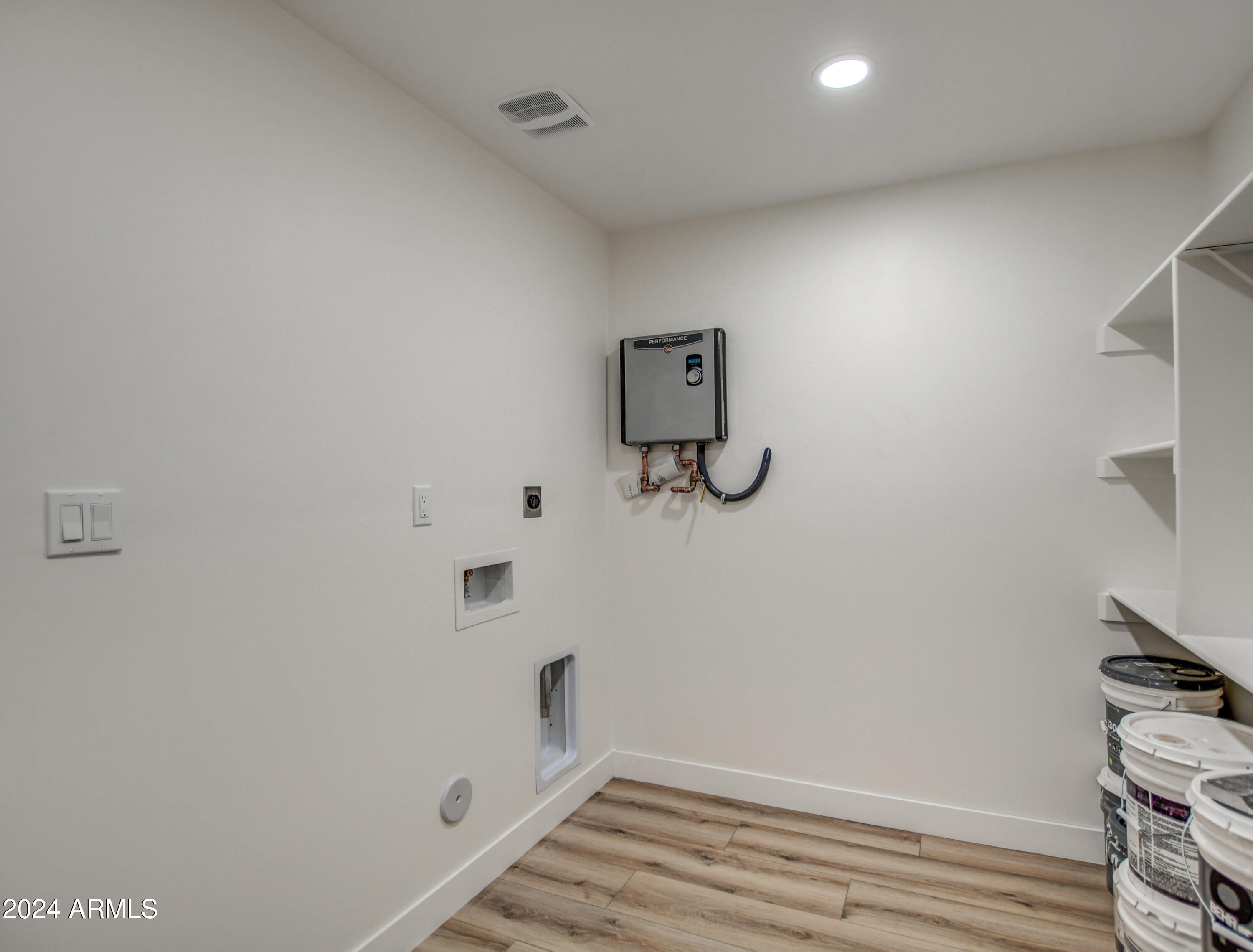 1553 West 5th Place Tempe, AZ 85281 - Photo 16 of 30 a view of a room with wooden floor