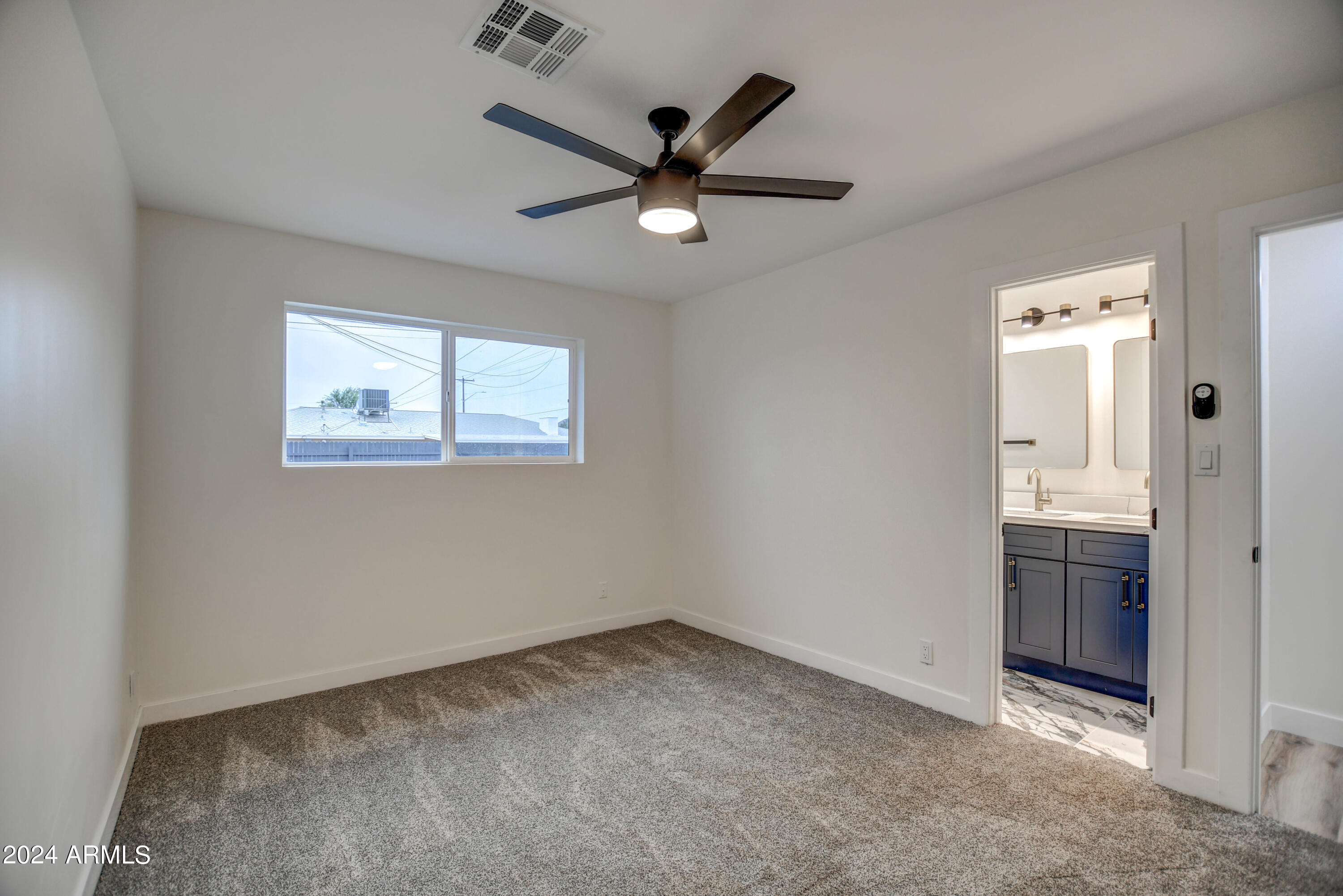 1553 West 5th Place Tempe, AZ 85281 - Photo 25 of 30 wooden floor in an empty room and a window