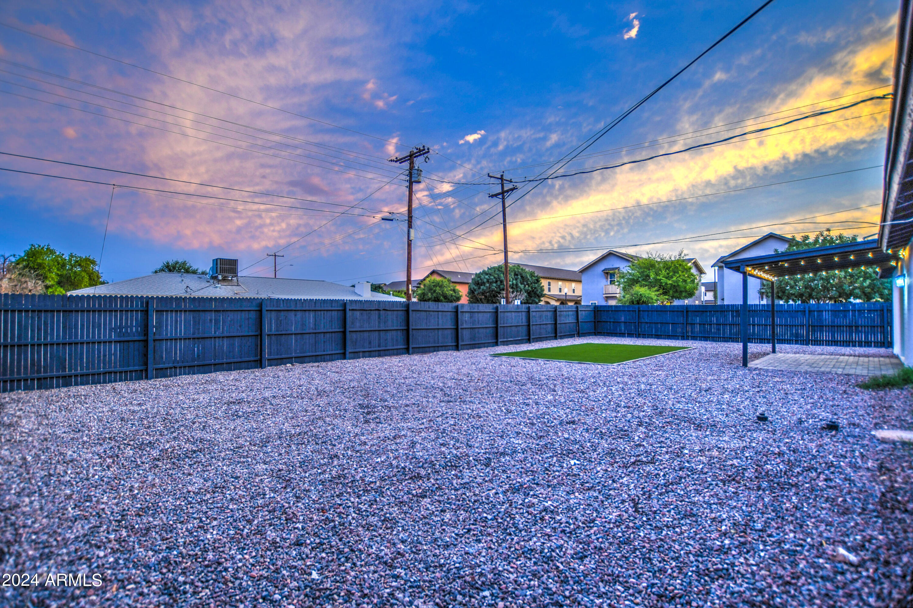 1553 West 5th Place Tempe, AZ 85281 - Photo 30 of 30 a view of a backyard with wooden fence