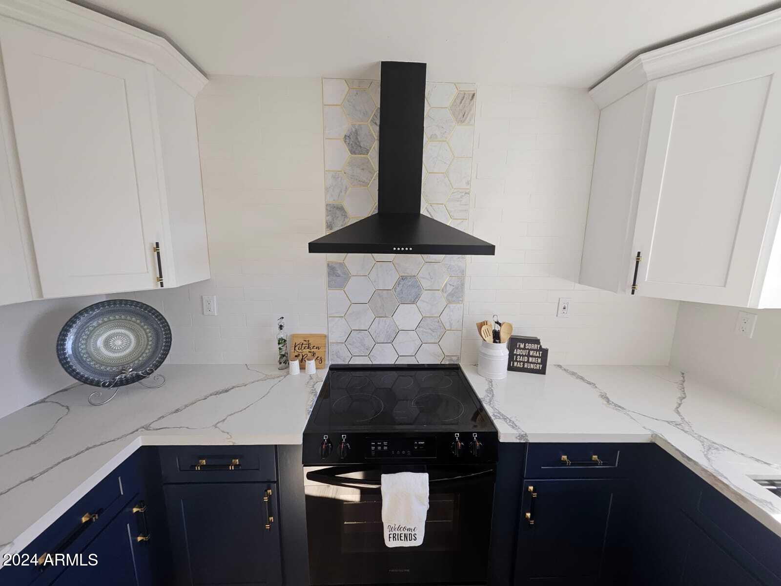 1553 West 5th Place Tempe, AZ 85281 - Photo 9 of 30 a kitchen with a stove and a sink