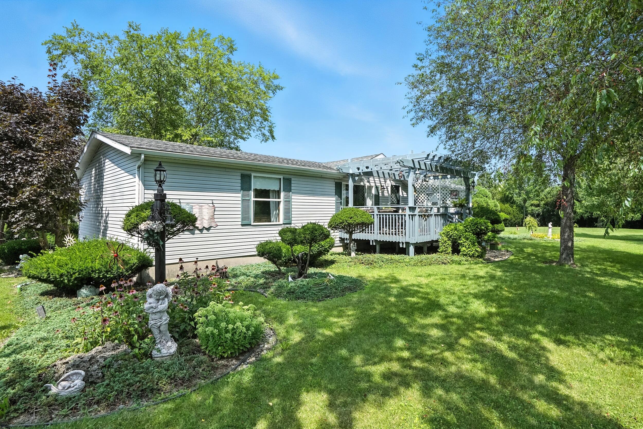 a house view with a garden space