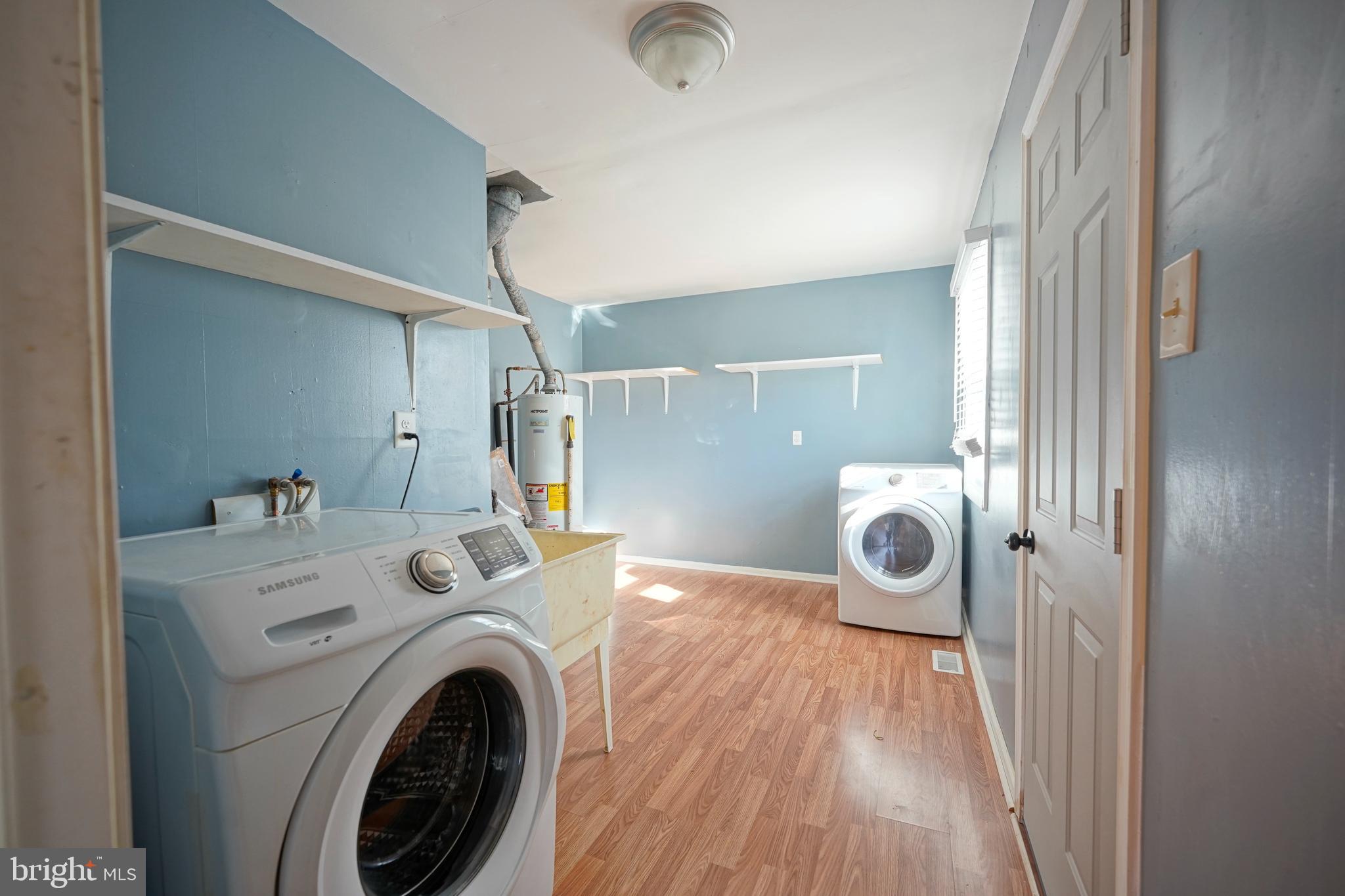 523 Carver Court Lawnside, NJ 08045 - Photo 28 of 39 a view of a storage & utility room with washer and dryer