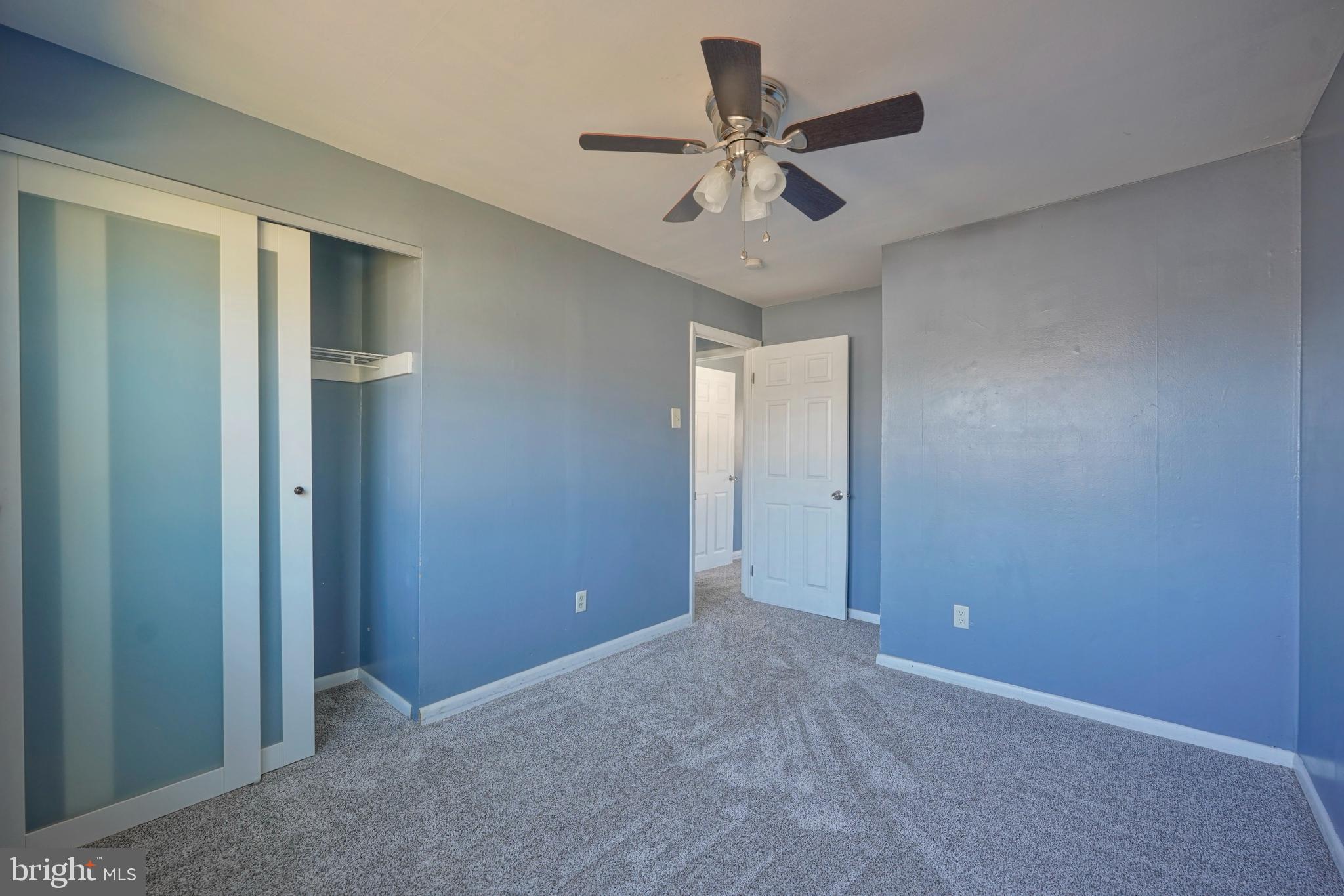523 Carver Court Lawnside, NJ 08045 - Photo 34 of 39 an empty room with chandelier fan