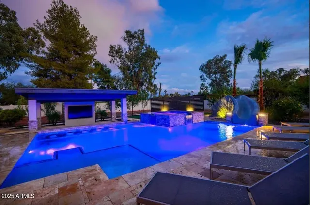 a view of a yard with furniture