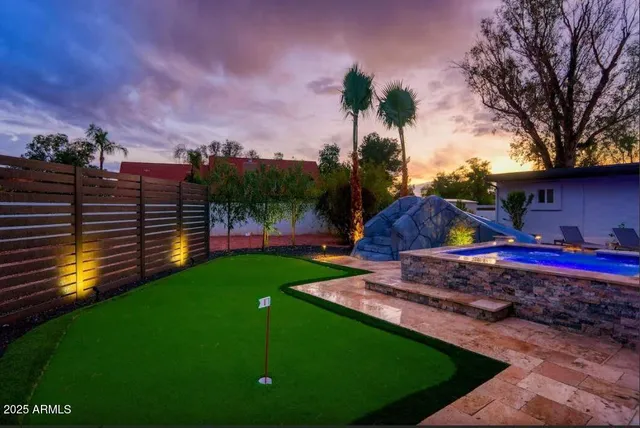 a view of a garden with an outdoor space