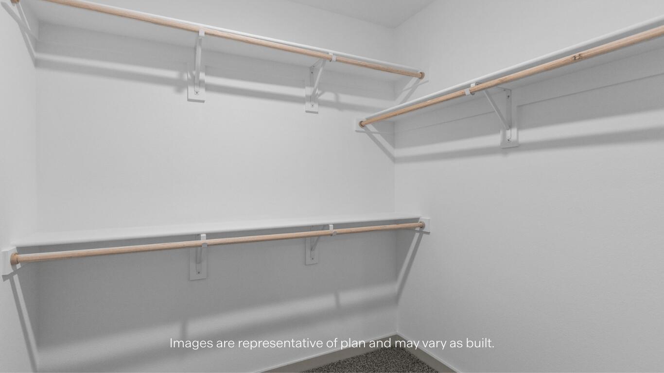 2305 150th Place Lubbock, TX 79423 - Photo 13 of 14 a view of a room with racks on the wall
