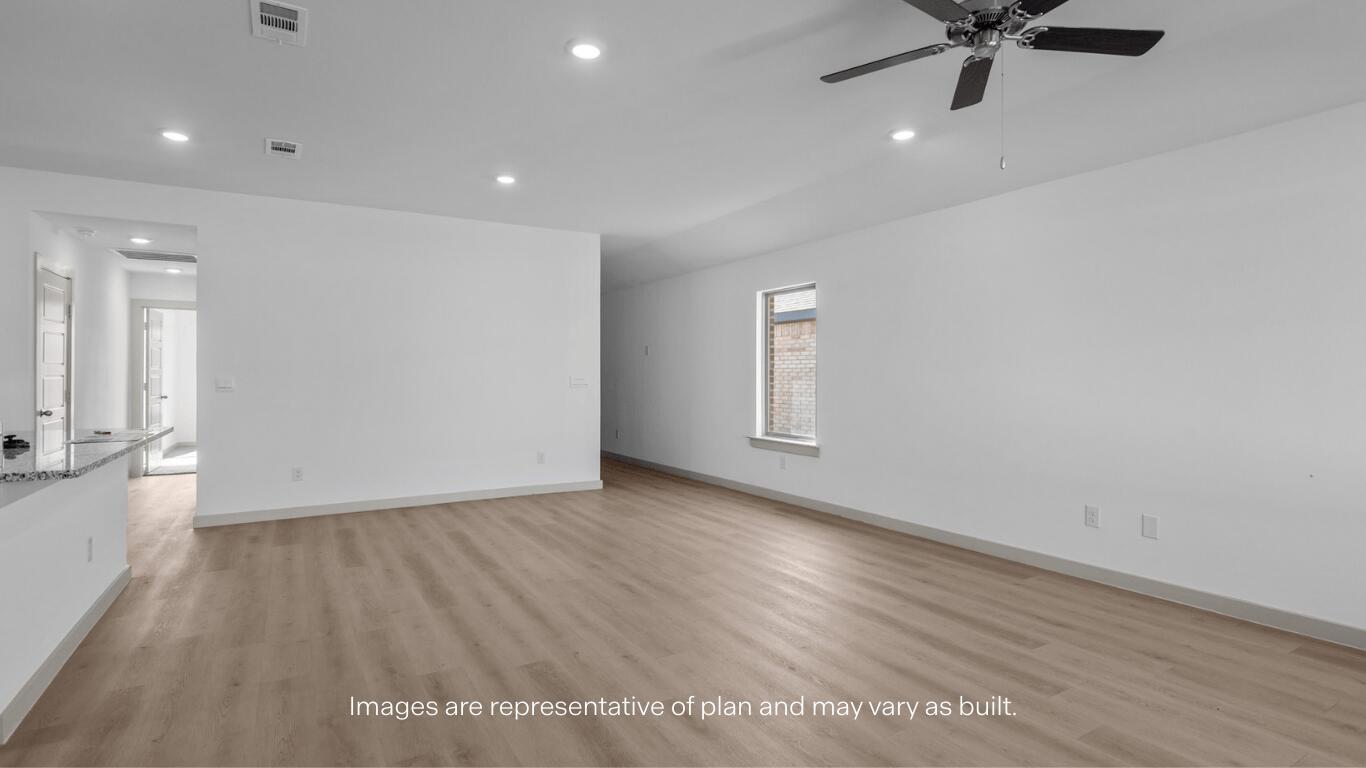 2305 150th Place Lubbock, TX 79423 - Photo 2 of 14 a view of an empty room with a window