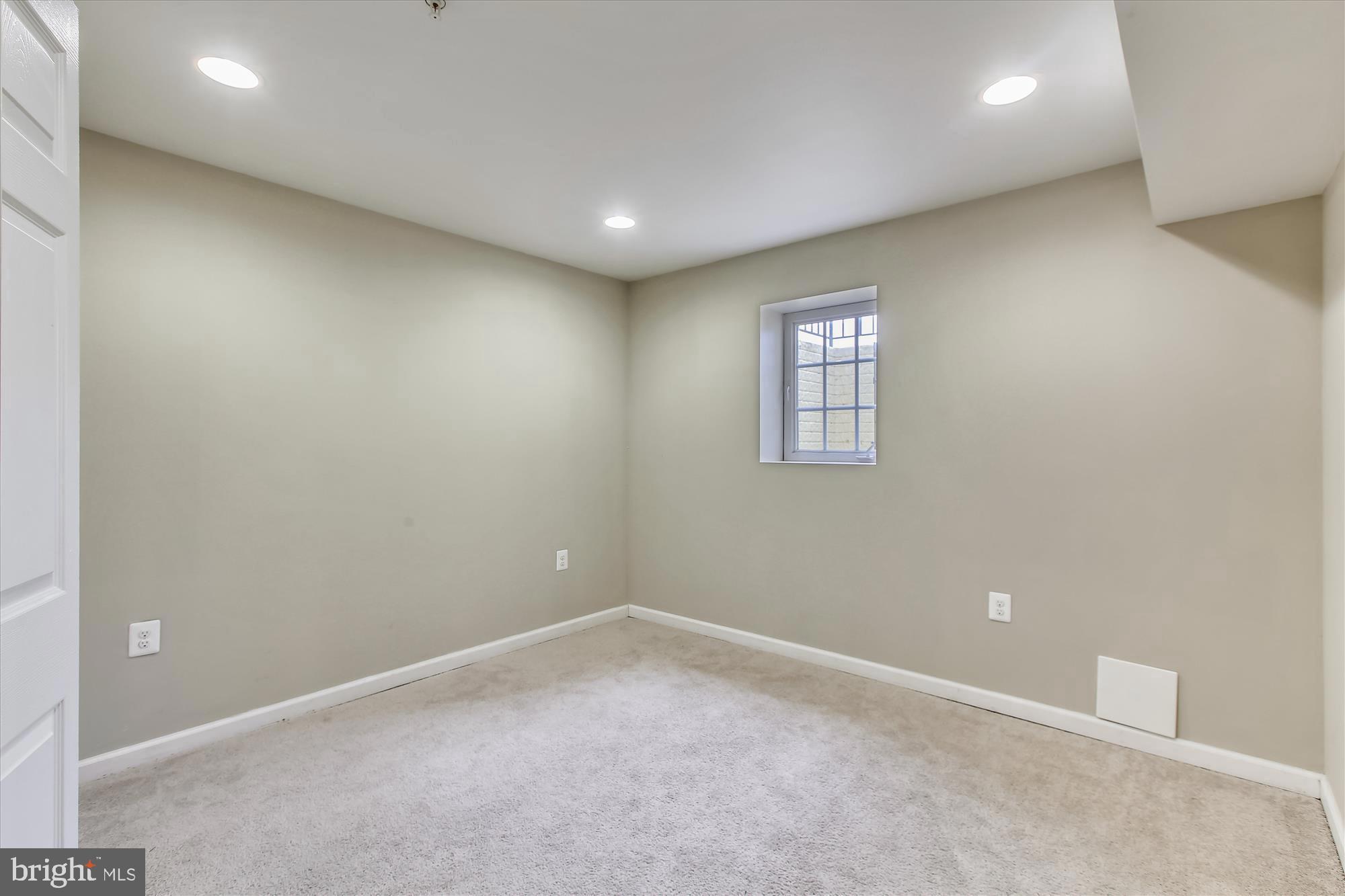 1004 Gaither Road Rockville, MD 20850 - Photo 20 of 34 an empty room with windows