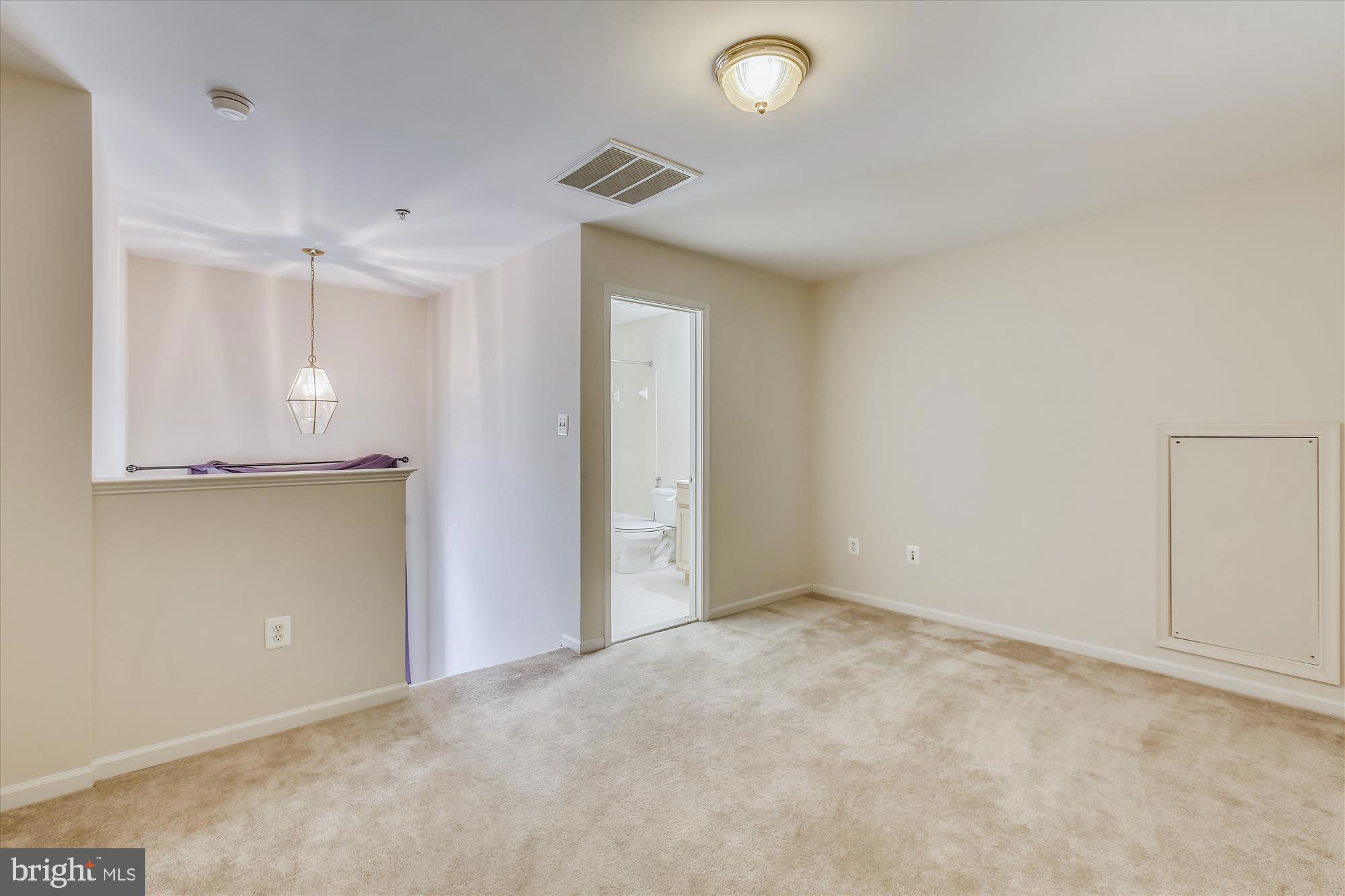 1004 Gaither Road Rockville, MD 20850 - Photo 25 of 34 an empty room with a empty space and windows