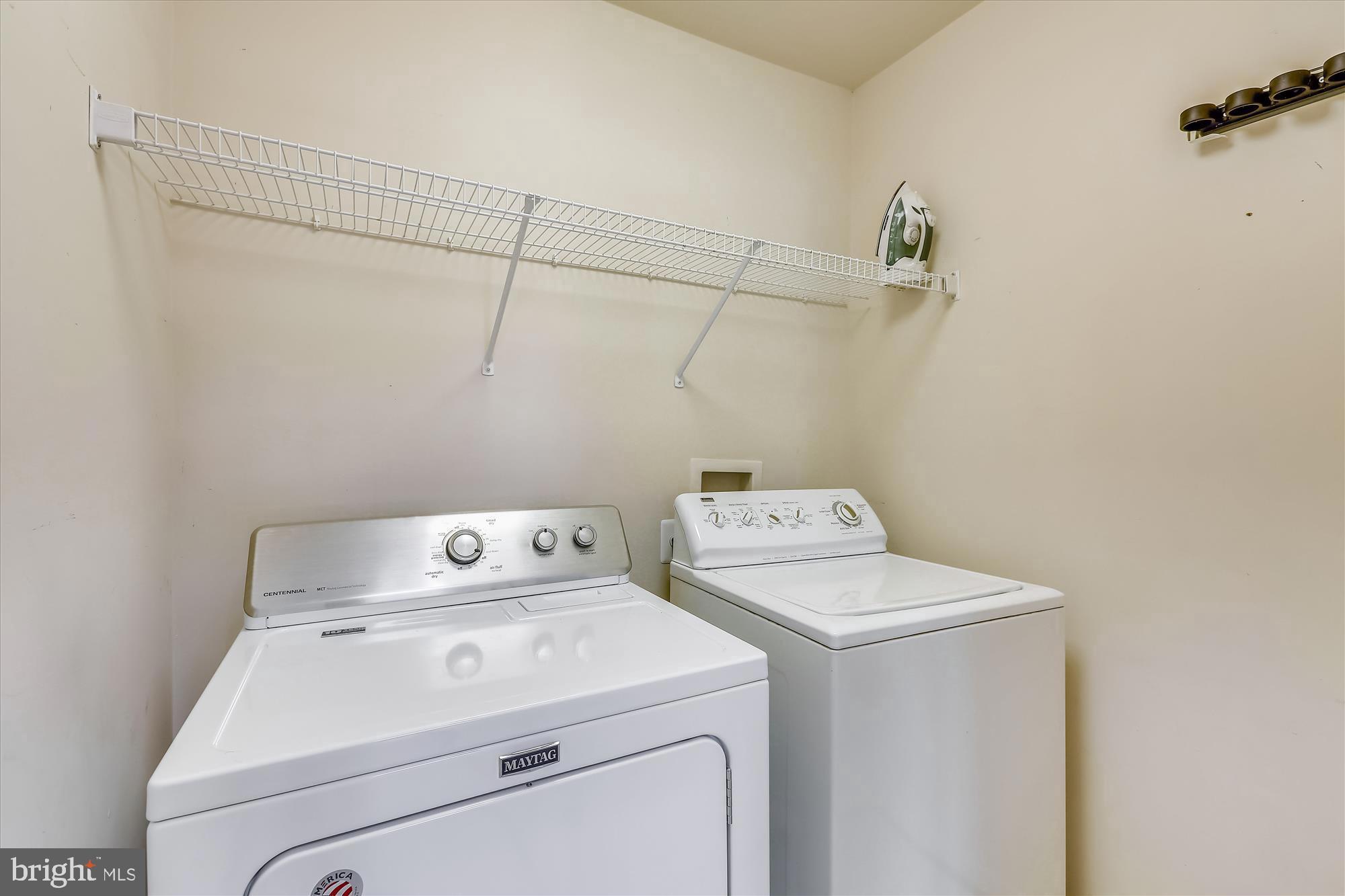 1004 Gaither Road Rockville, MD 20850 - Photo 27 of 34 a utility room with dryer and washer