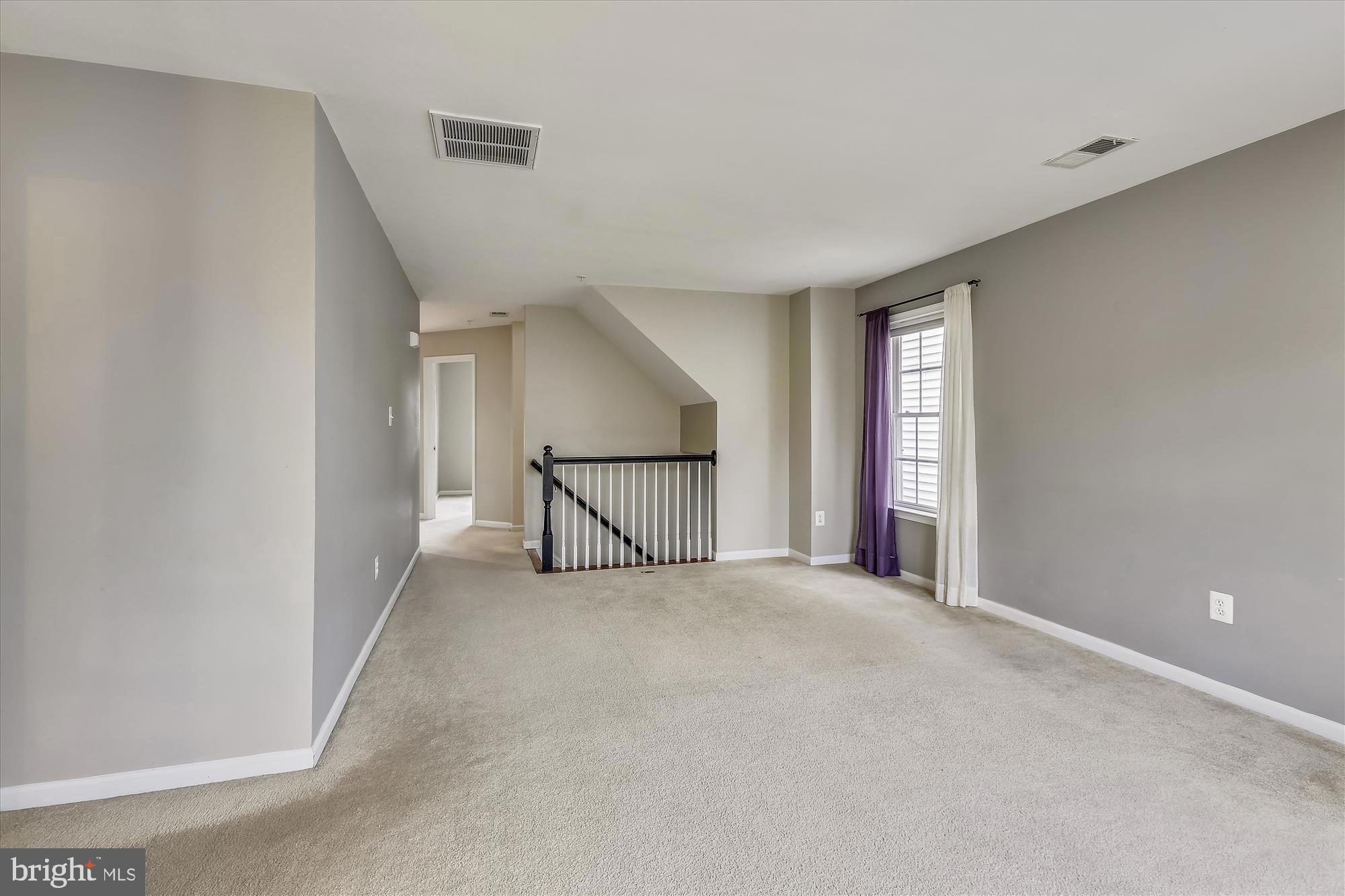 1004 Gaither Road Rockville, MD 20850 - Photo 31 of 34 a view of an empty room with a window