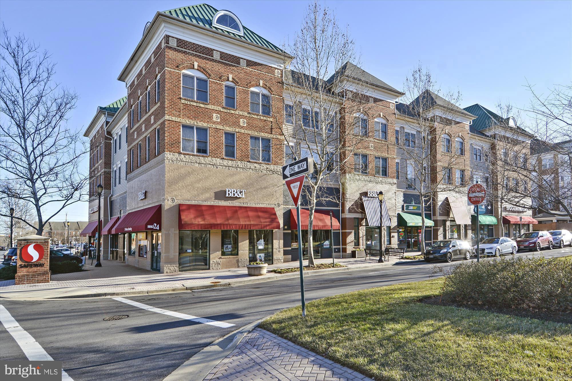 1004 Gaither Road Rockville, MD 20850 - Photo 5 of 34 a front view of a building with street