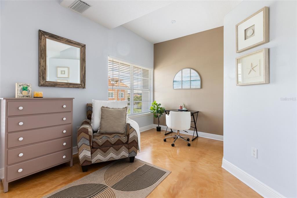 141 175th Avenue East Redington Shores, FL 33708 - Photo 17 of 51 a living room with furniture and a window