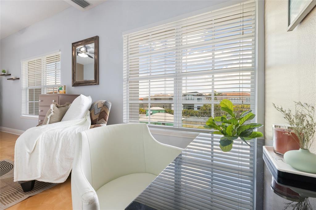 141 175th Avenue East Redington Shores, FL 33708 - Photo 23 of 51 a living room with furniture and a large window