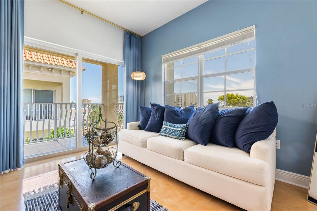 141 175th Avenue East Redington Shores, FL 33708 - Photo 26 of 51 a living room with furniture and a potted plant