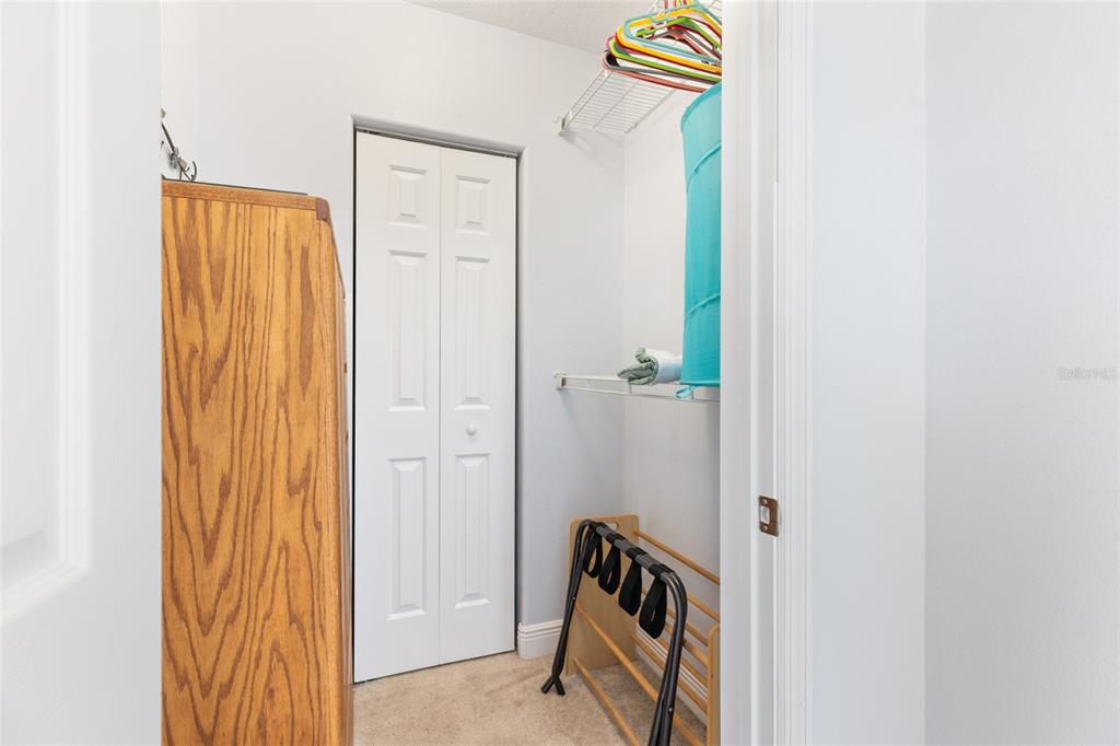 141 175th Avenue East Redington Shores, FL 33708 - Photo 35 of 51 a view of bathroom with a sink and mirror