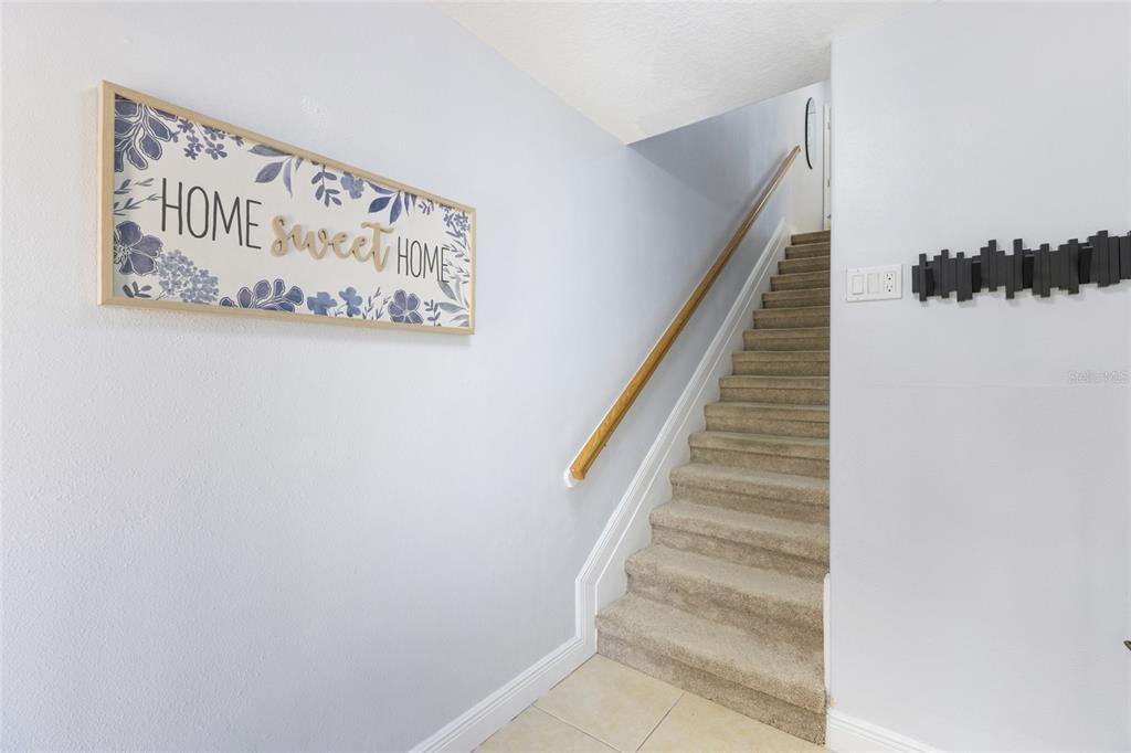 141 175th Avenue East Redington Shores, FL 33708 - Photo 5 of 51 a view of a hallway with stairs