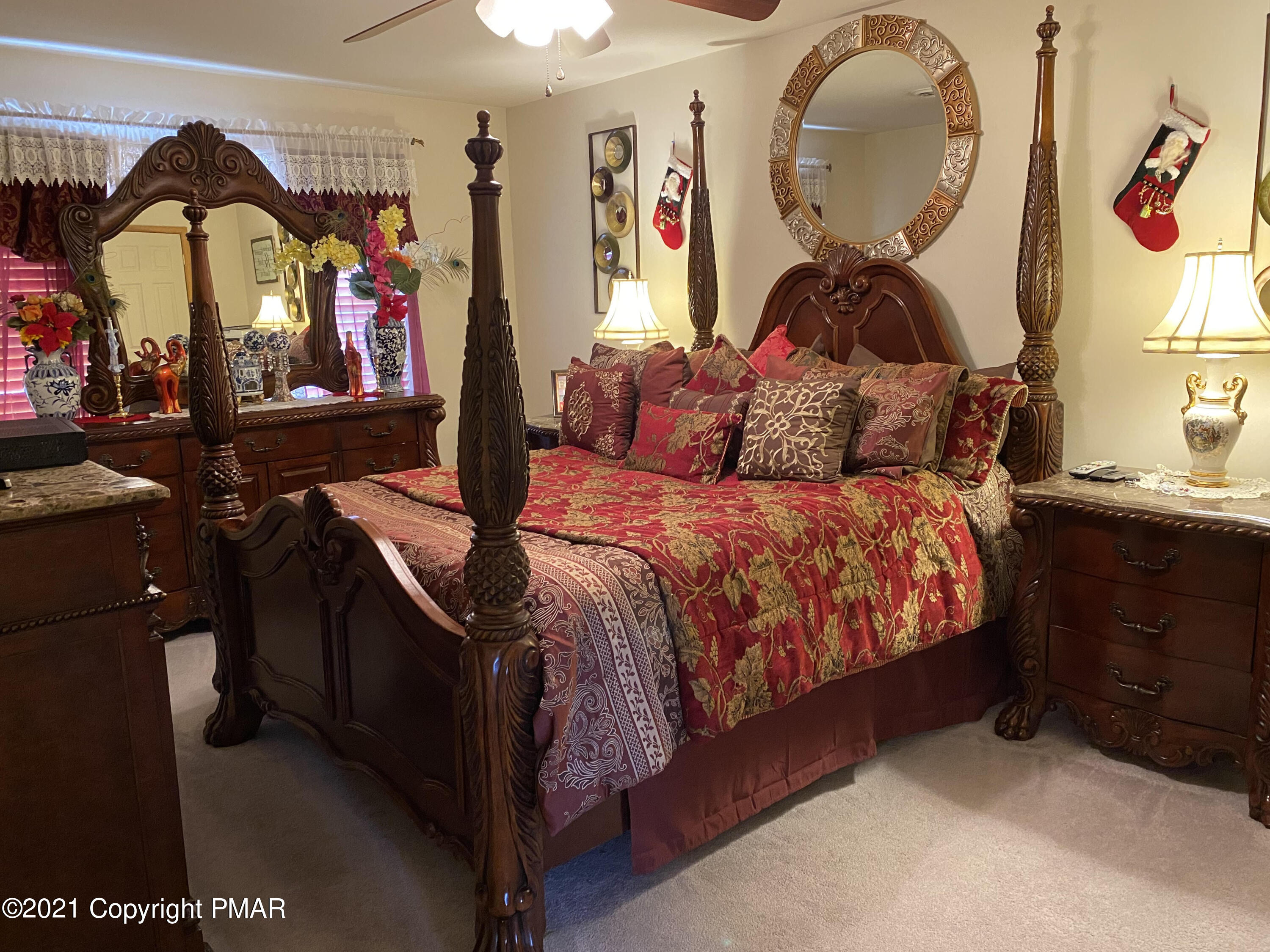 341 Chestnut Road Blakeslee, PA 18610 - Photo 13 of 30 a bed room with a bed and a mirror