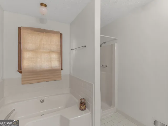 a bathroom with a bathtub