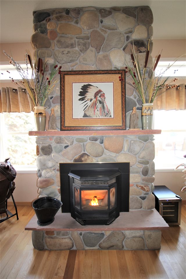 3455 F Road Clifton, CO 81520 - Photo 11 of 29 a living room with furniture and a fireplace