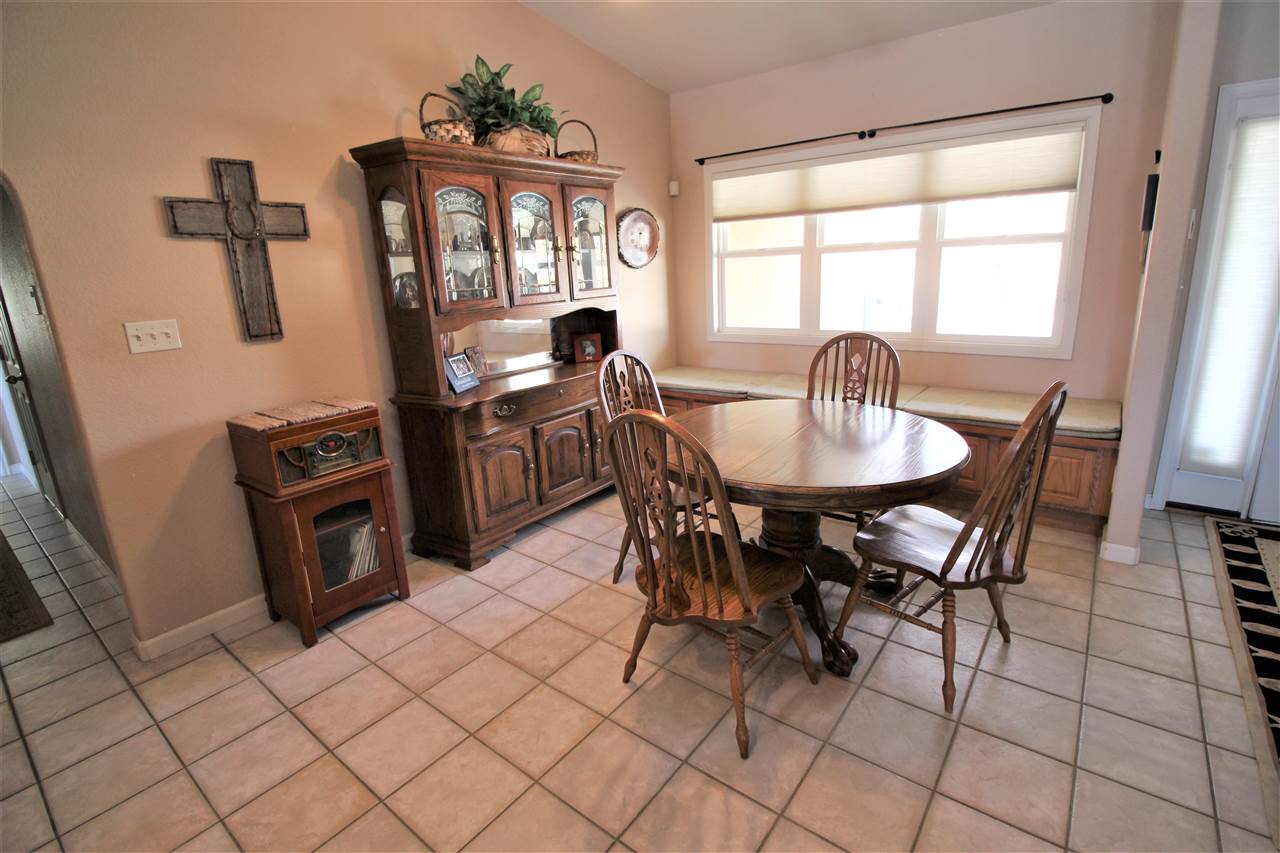 3455 F Road Clifton, CO 81520 - Photo 13 of 29 a view of a dining room with furniture window and outside view