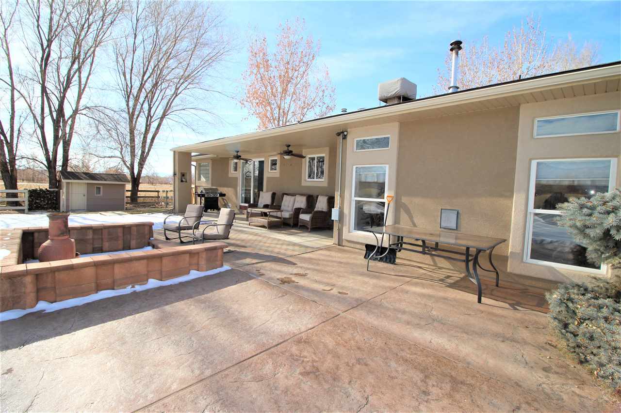 3455 F Road Clifton, CO 81520 - Photo 25 of 29 a view of a building with a patio