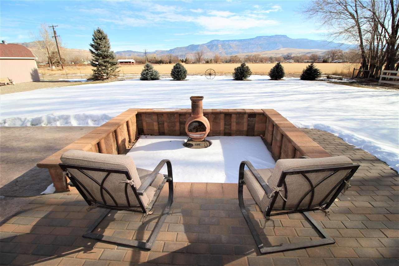 3455 F Road Clifton, CO 81520 - Photo 26 of 29 a view of swimming pool with outdoor seating