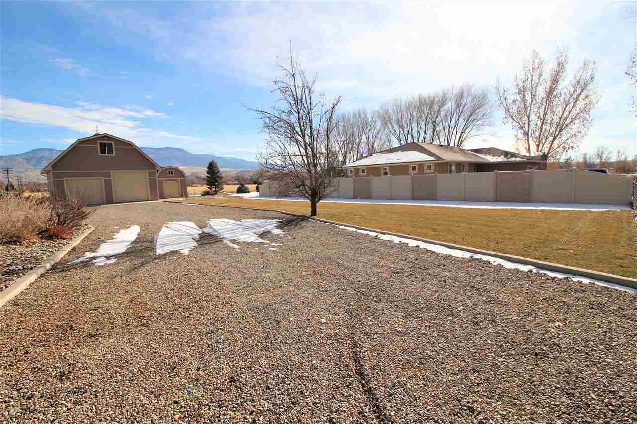 3455 F Road Clifton, CO 81520 - Photo 27 of 29 a view of large tree in front of a house