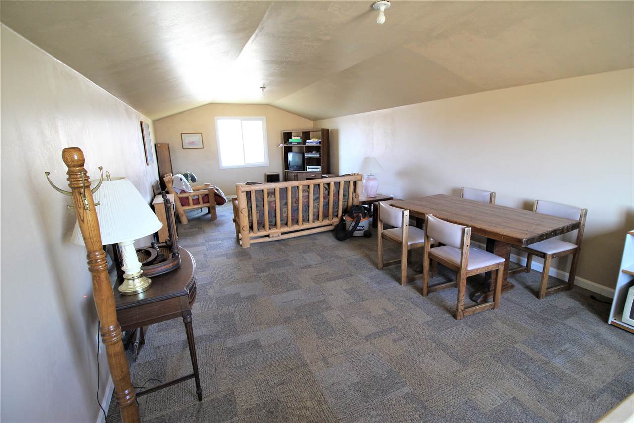 3455 F Road Clifton, CO 81520 - Photo 29 of 29 a view of a livingroom with furniture and front door