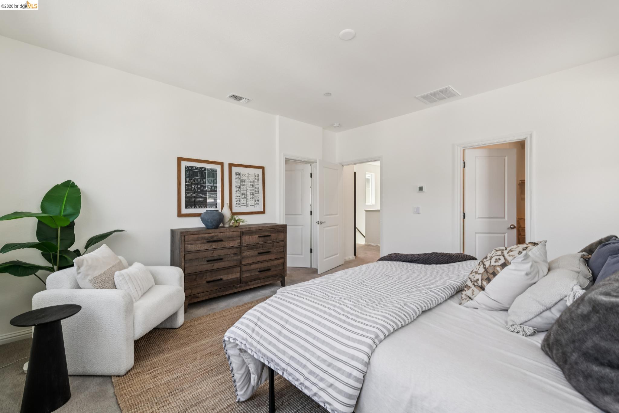 24157 Amaranth Loop Hayward, CA 94541 - Photo 37 of 63 Spacious bedroom with light gray carpet and white walls