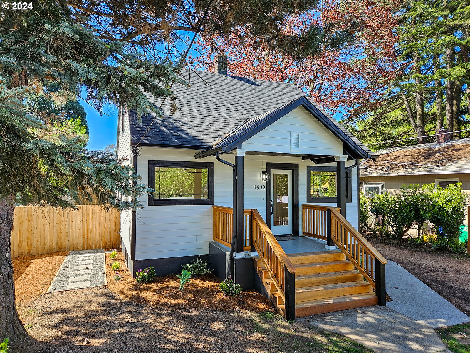 1532 Northeast Morgan Street Portland, OR 97211 - Photo 2 of 35 a view of an house with backyard space and balcony