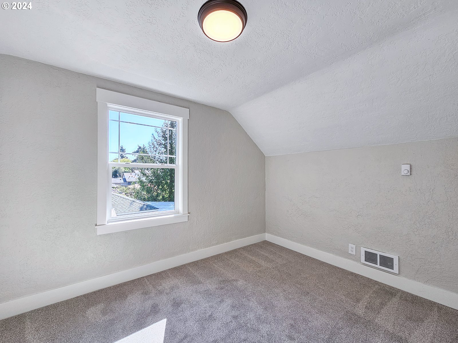 1532 Northeast Morgan Street Portland, OR 97211 - Photo 26 of 35 an empty room with windows