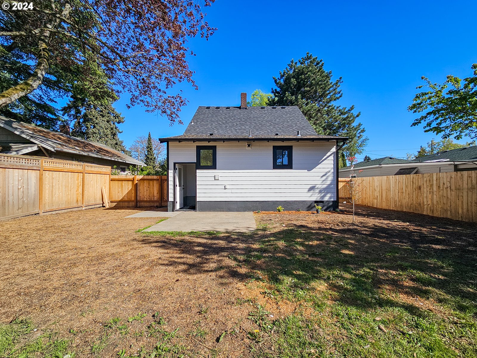 1532 Northeast Morgan Street Portland, OR 97211 - Photo 33 of 35 a house with a yard