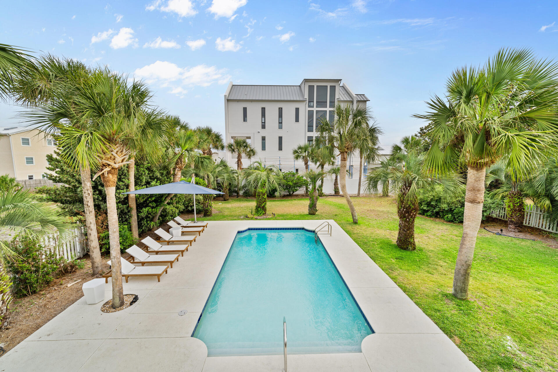 169 Pompano Street Inlet Beach, FL 32461 - Photo 2 of 91 a view of swimming pool with a garden and seating area