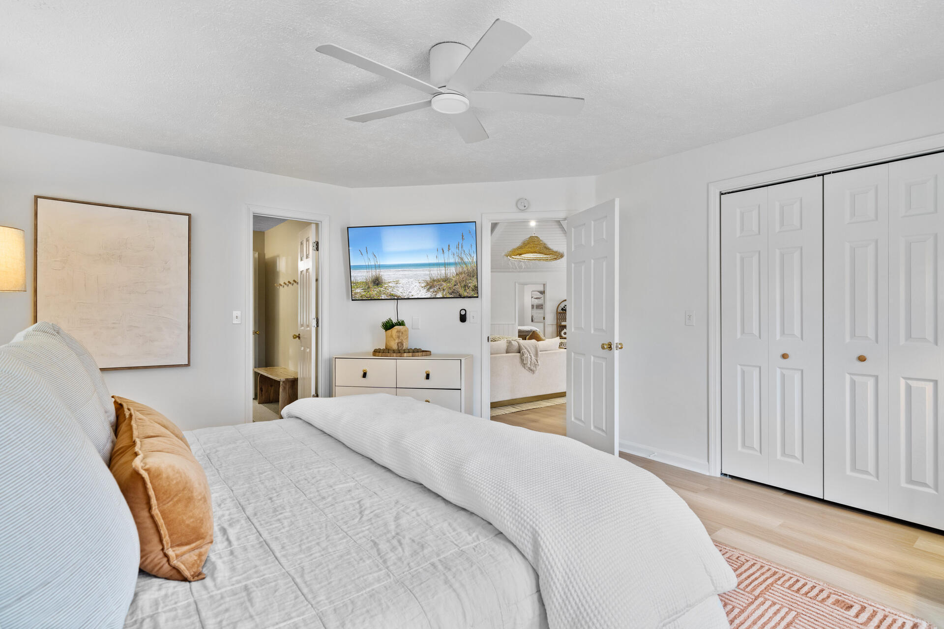 169 Pompano Street Inlet Beach, FL 32461 - Photo 37 of 91 a bedroom with a bed and a chandelier