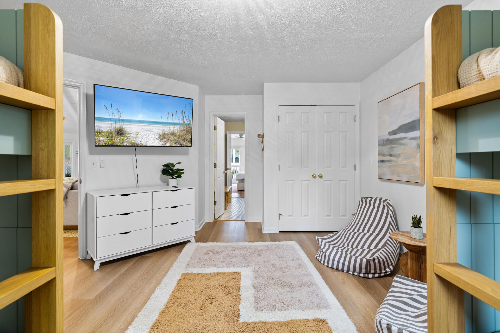 169 Pompano Street Inlet Beach, FL 32461 - Photo 39 of 91 a room with furniture and a flat screen tv