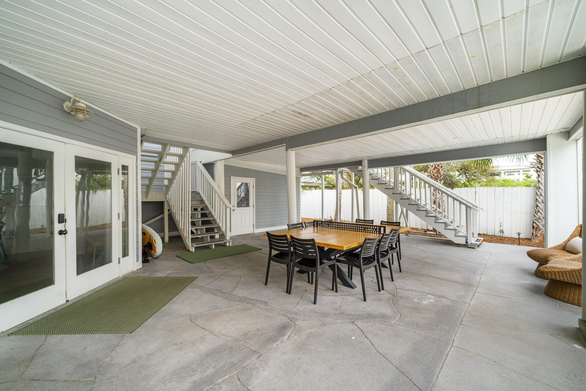 169 Pompano Street Inlet Beach, FL 32461 - Photo 45 of 91 a view of a patio with table and chairs near a barn