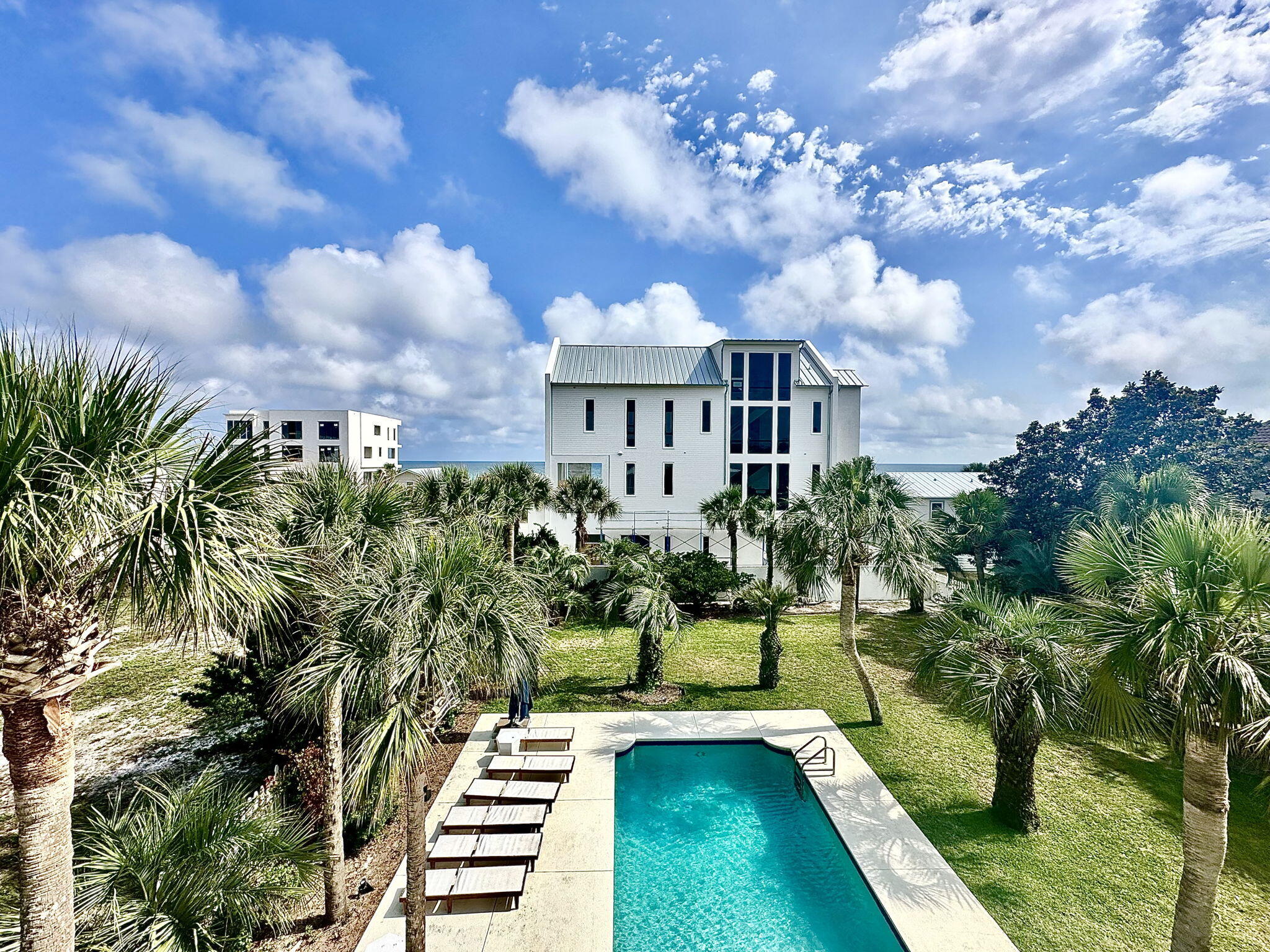 169 Pompano Street Inlet Beach, FL 32461 - Photo 5 of 91 a view of a house with a garden