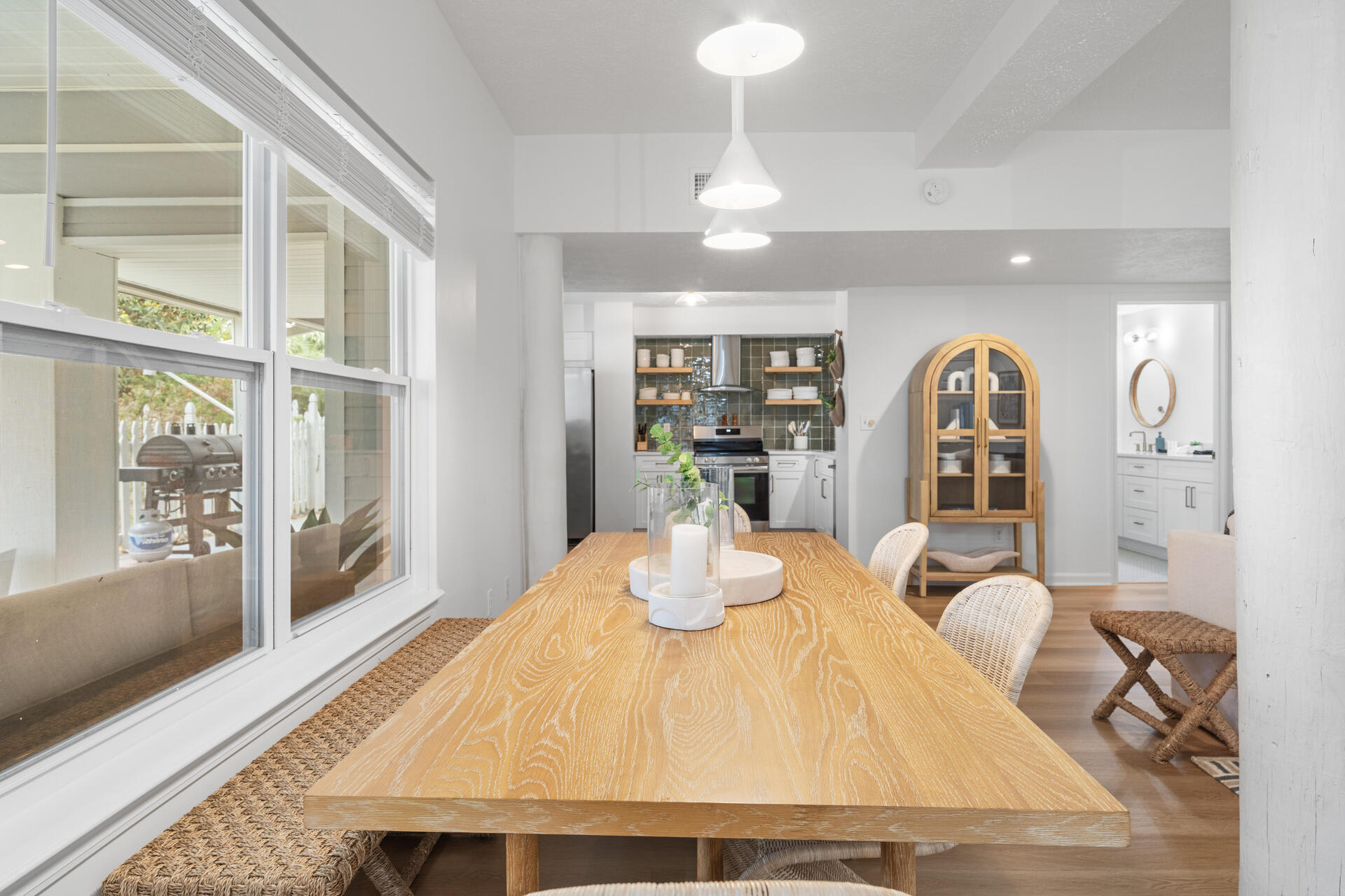 169 Pompano Street Inlet Beach, FL 32461 - Photo 51 of 91 a bedroom with a large bed and wooden floor