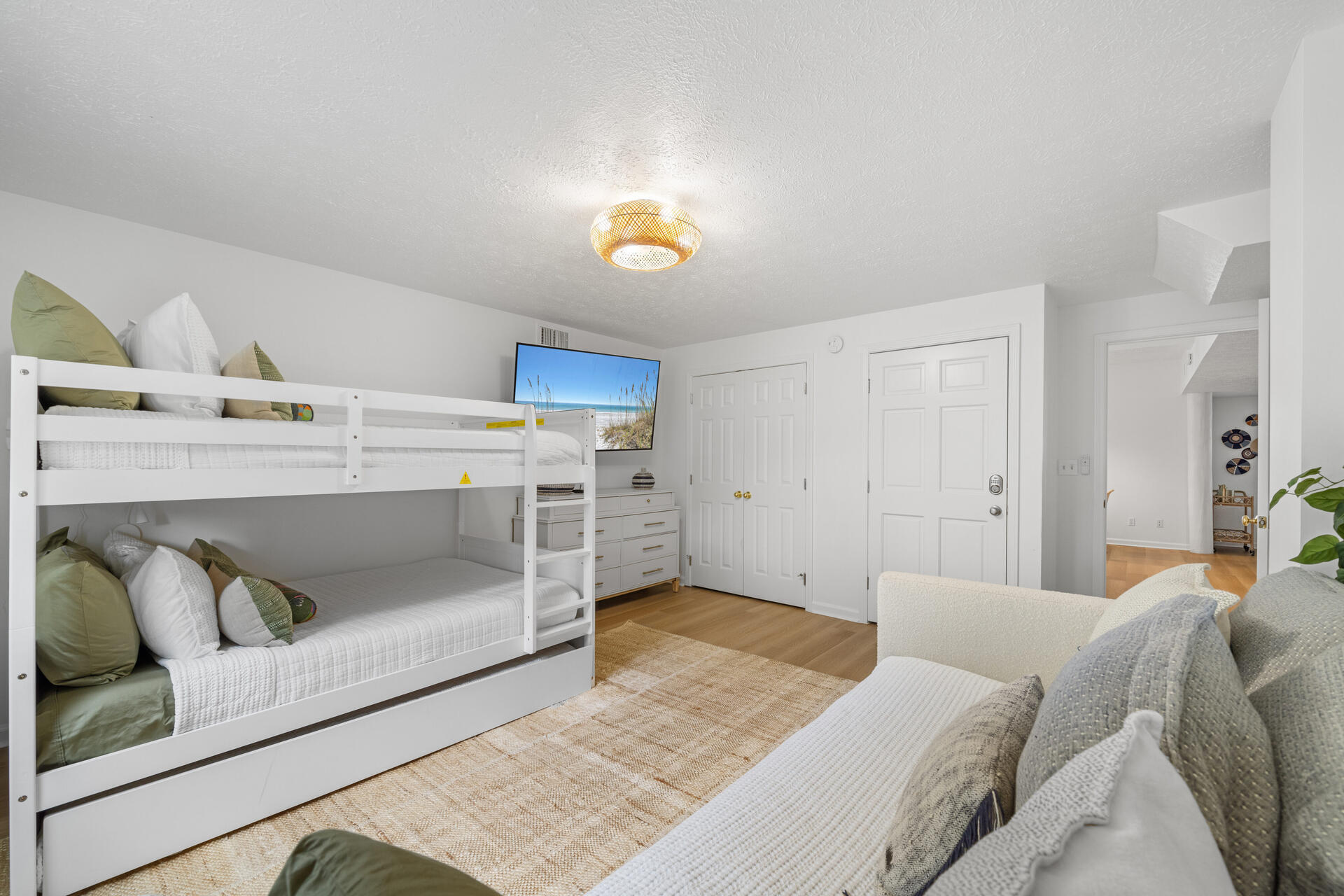 169 Pompano Street Inlet Beach, FL 32461 - Photo 59 of 91 a bedroom with a bed and a couch