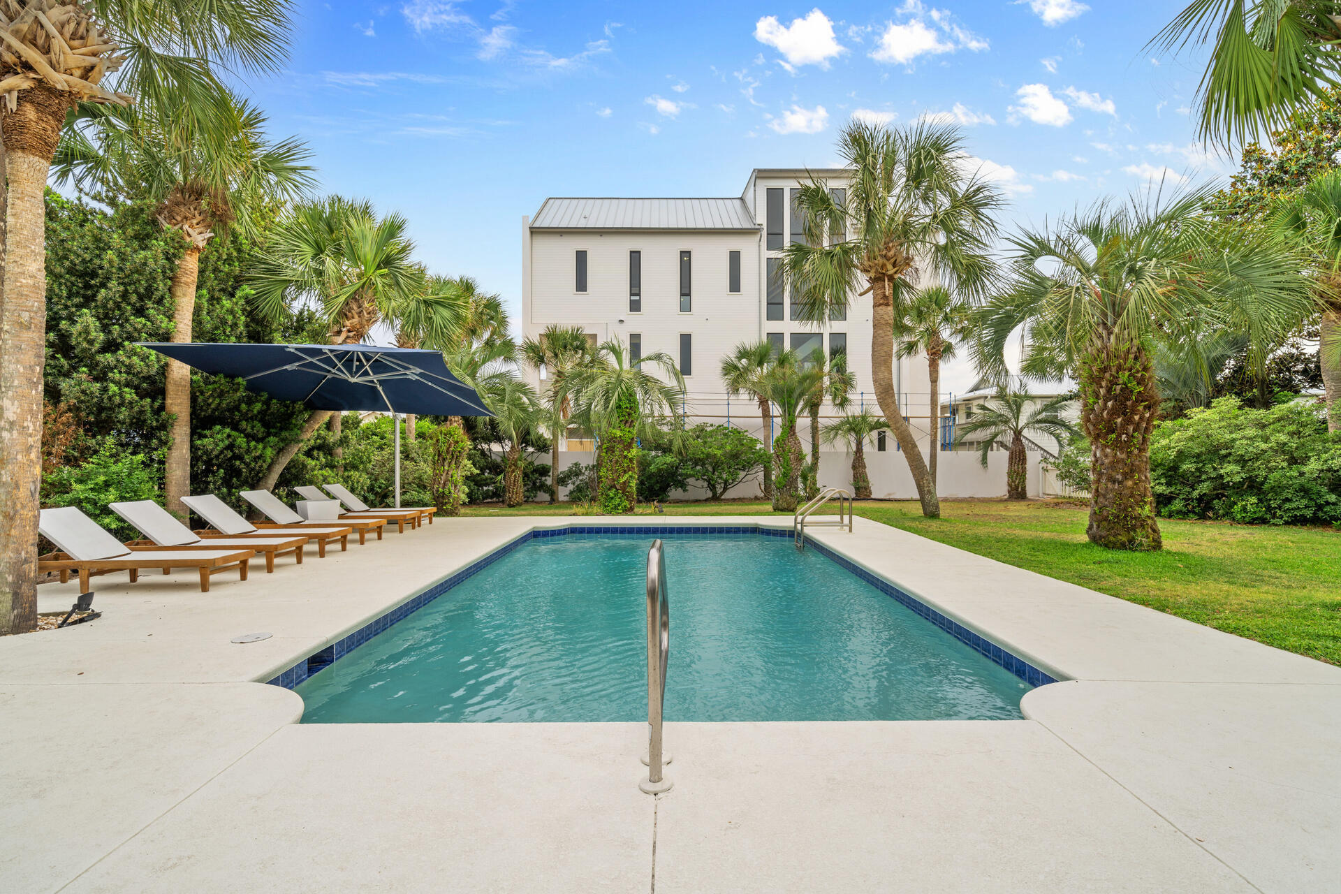 169 Pompano Street Inlet Beach, FL 32461 - Photo 64 of 91 a view of a swimming pool with a yard