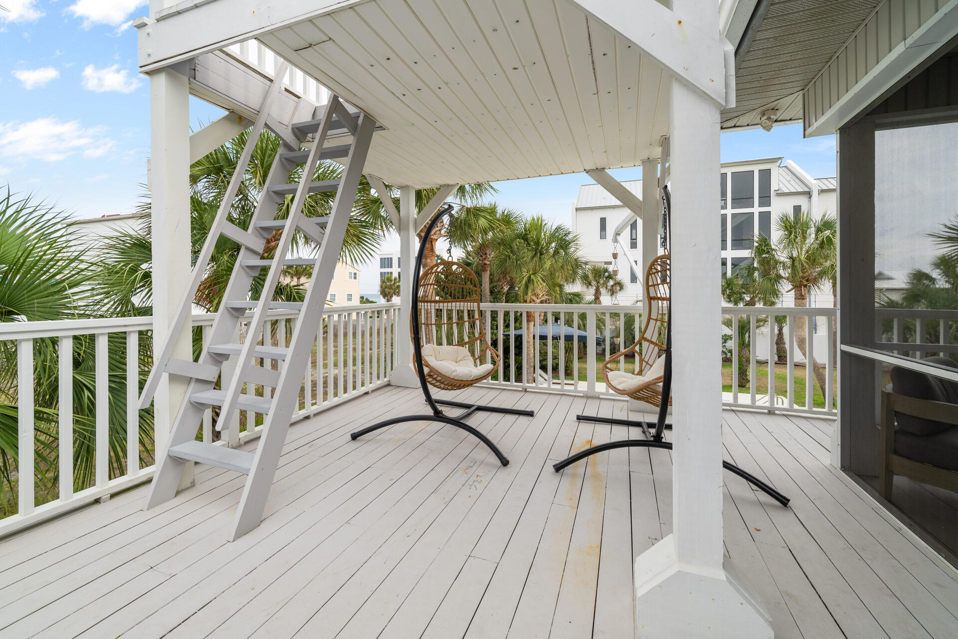 169 Pompano Street Inlet Beach, FL 32461 - Photo 74 of 91 a view of balcony with wooden floor and outdoor seating